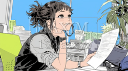 書類の確認をしている若い女性