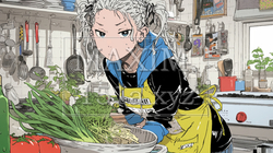 料理に悪戦苦闘中の若い女性