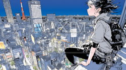 都市の夜景を眺めている女性