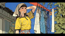 洗濯物を干している若い女性
