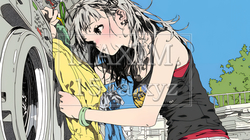 洗濯をしている若い女性
