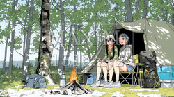 女友達と一緒にテントキャンプを楽しむ若い女性