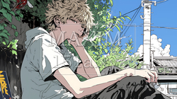 タバコをくわえて座り込んでいる若い男性