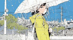 雨の中を傘をさして歩く若い女性