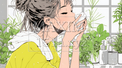 洗面所で朝の洗顔をする女性