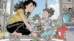 家の中で子どもと遊んでいる若い母親