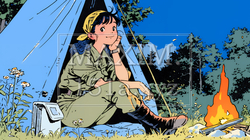 ソロキャンプを楽しんでいる若い女性
