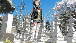 墓参りをしている若い女性