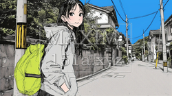 住宅街を歩く若い女性