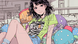 クッションがいっぱいのベッドで寛いでいる若い女性
