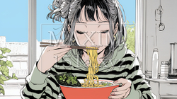 ラーメンを食べている若い女性