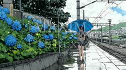 鉄道の駅のプラットフォームに植えられた満開のあじさいと梅雨の雨と若い女性｜5655047-8532