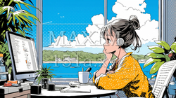 沖縄の海辺のオフィスでヘッドセットをつけてPCを操作している若い女性