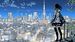 都市の夜景を眺めている女性