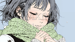 かじかんだ手に息を吹きかけて温めている若い女性