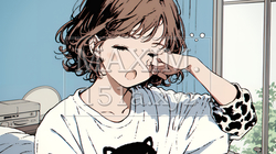 あくびをしている若い女性