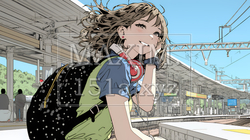 ホームで電車待ちをしている若い女性