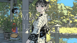 浴衣姿で夕涼みをしている若い女性