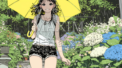 あじさいとカジュアルな服装の若い女性