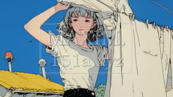 洗濯物を干している若い女性