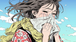 くしゃみをした若い女性
