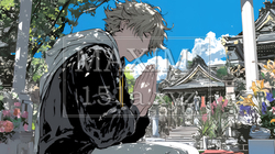 墓参りをしている若い男性