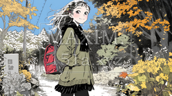 紅葉の小径を歩く若い女性