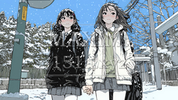 雪の日に友達と通学する女子高生