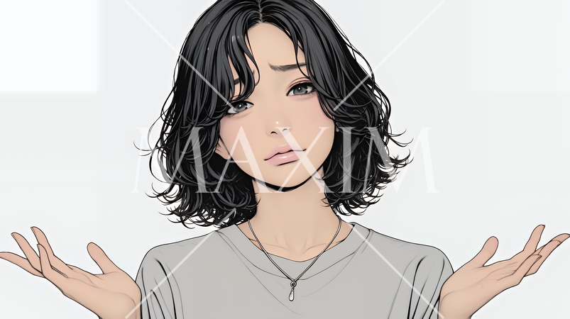 肩をすくめて困惑・諦めの仕草をしている若い女性