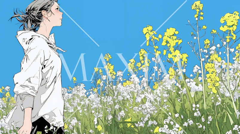 菜の花畑にいる若い女性