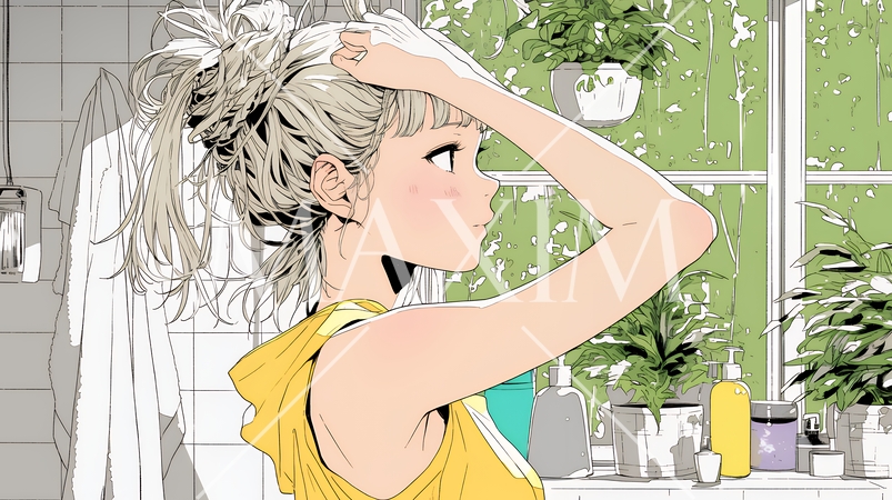 朝支度：洗面所で髪をまとめている若い女性