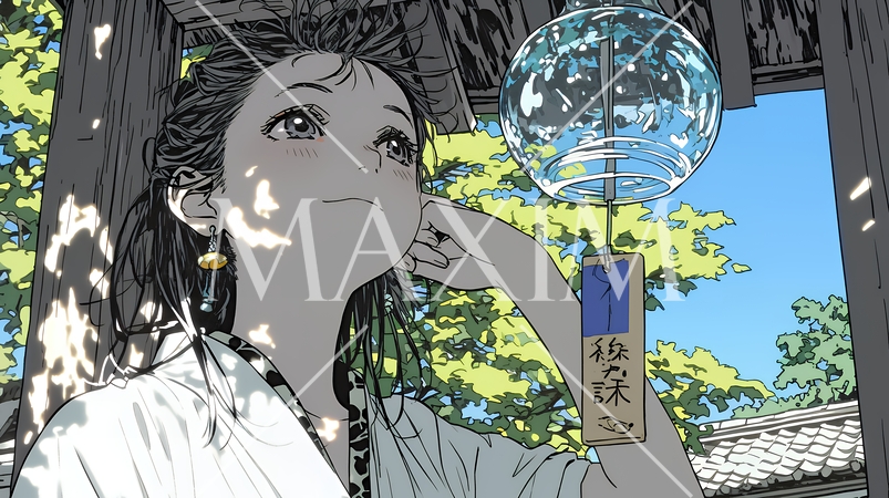 風鈴の音色を聞いている若い女性