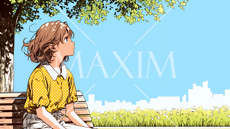 公園のベンチでひとり静かにくつろぐ若い女性