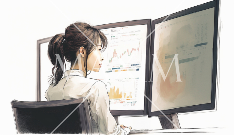 デスクに向かって取引画面を操作する女性トレーダーの横顔。