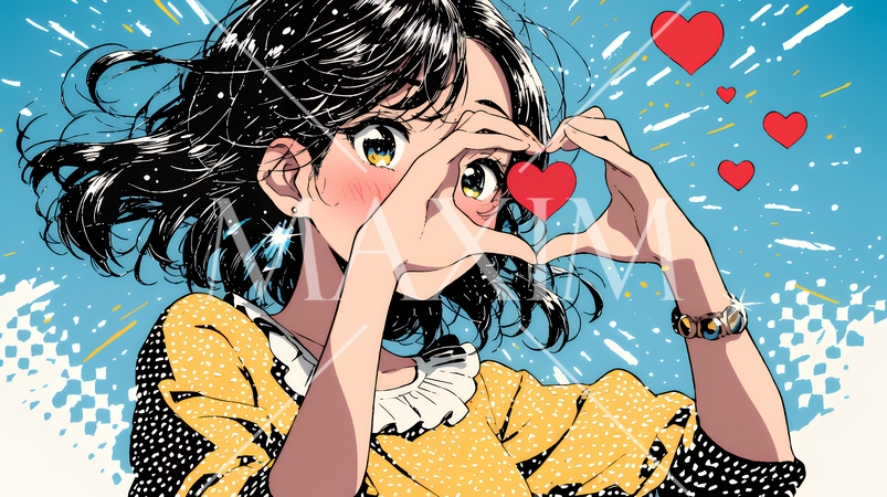 ハートマークを手で作り愛情表現をしている若い女性