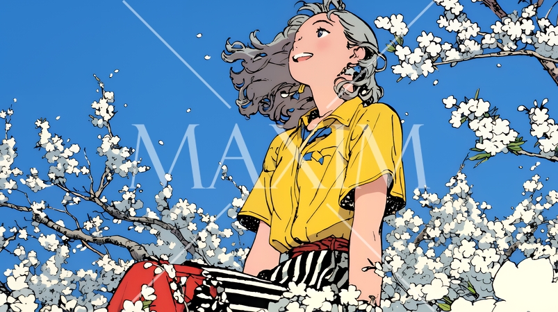 満開の桜の木の下を歩く若い女性