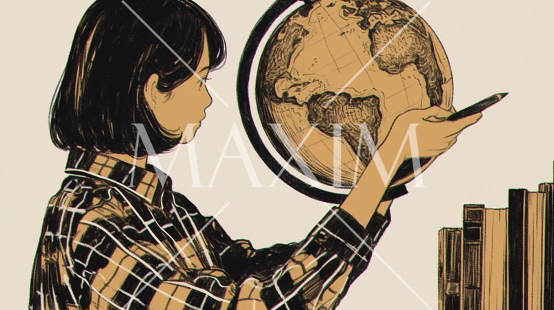 地球儀を持って海外旅行計画中の若い女性