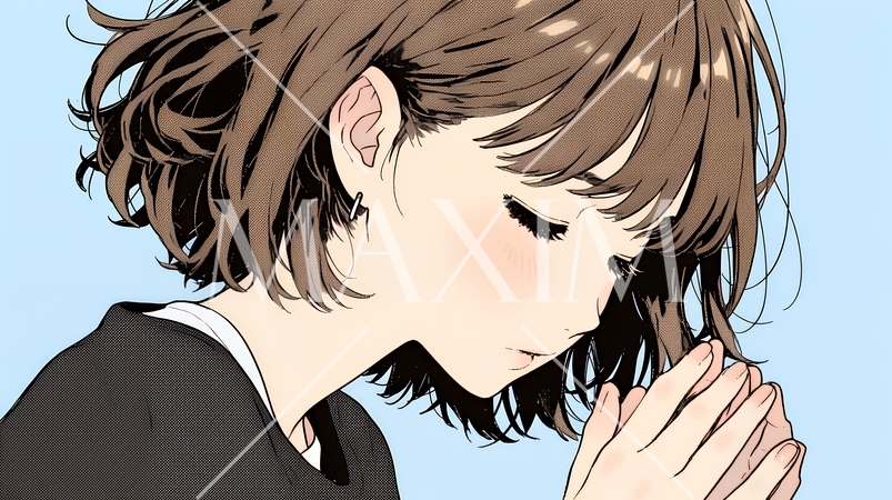 手を合わせてお祈りをしている若い女性