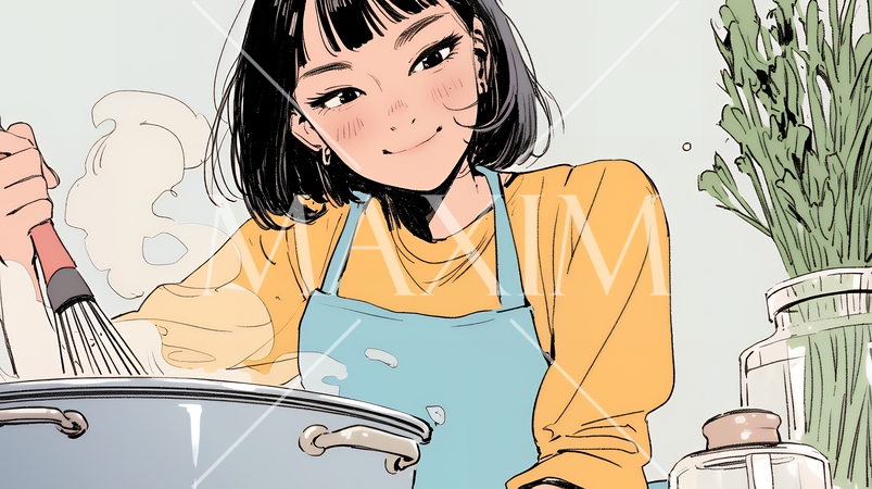 なれない料理に奮闘中の若い女性