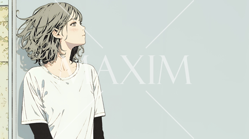 白い壁に向かって考え事をする若い女性