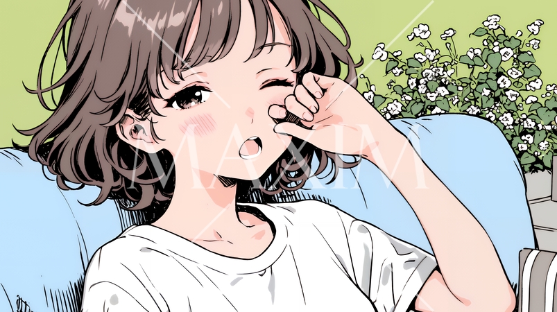 あくびをしている若い女性