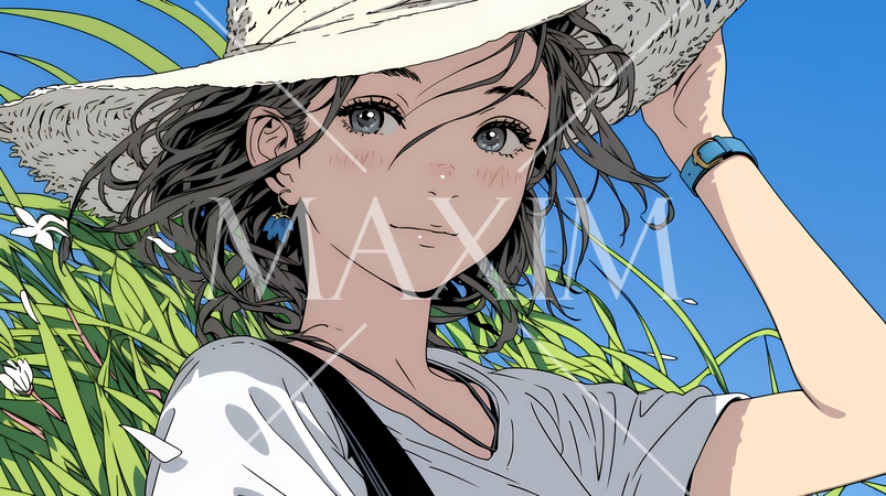 春風に飛ばされそうな帽子を、手で押さえる若い女性