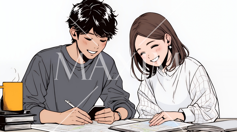 仲良く二人で旅行の計画を立てている若いカップル