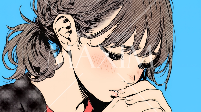 唇を噛んで不安そうな表情をしている若い女性