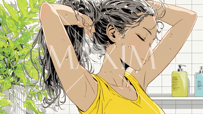 朝支度：洗面所で髪をまとめている若い女性