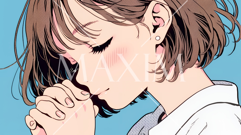 頬を赤らめて、照れ笑いする若い女性