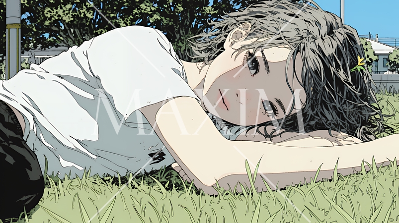 心地よさそうに地面に身を横たえる若い女性