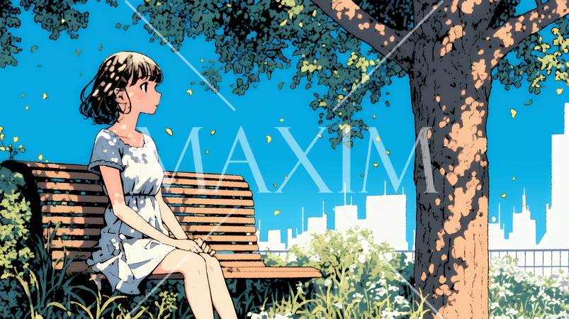 公園のベンチでひとり静かにくつろぐ若い女性