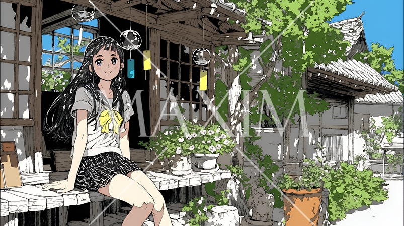 風鈴の音色を聞いている若い女性