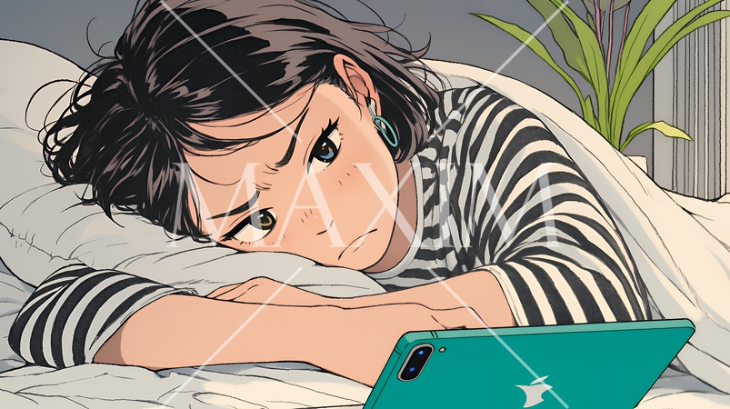 寝ようとしているときに嫌なメールを受け取り、不快そうな若い女性